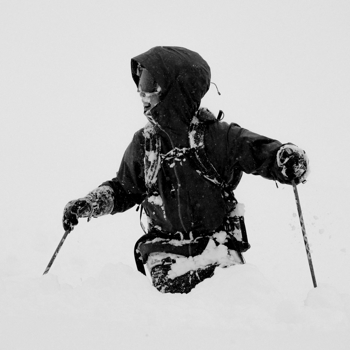 A skier covered in snow