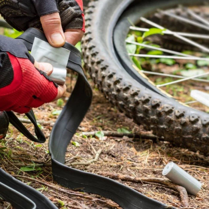 Duct_Tape_in_hand_in_use_biking.webp