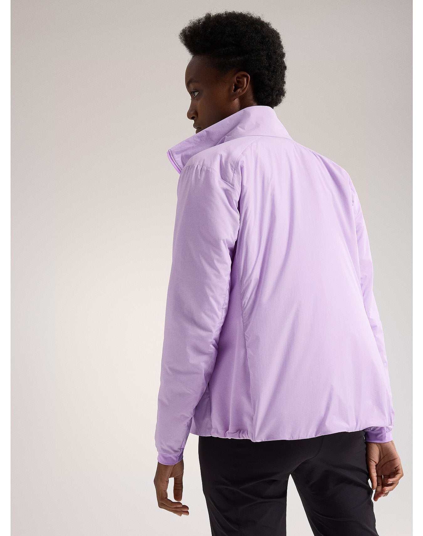 F23-X000006550-Atom-Jacket-Storm-Glow-Women-s-Back-View.jpg