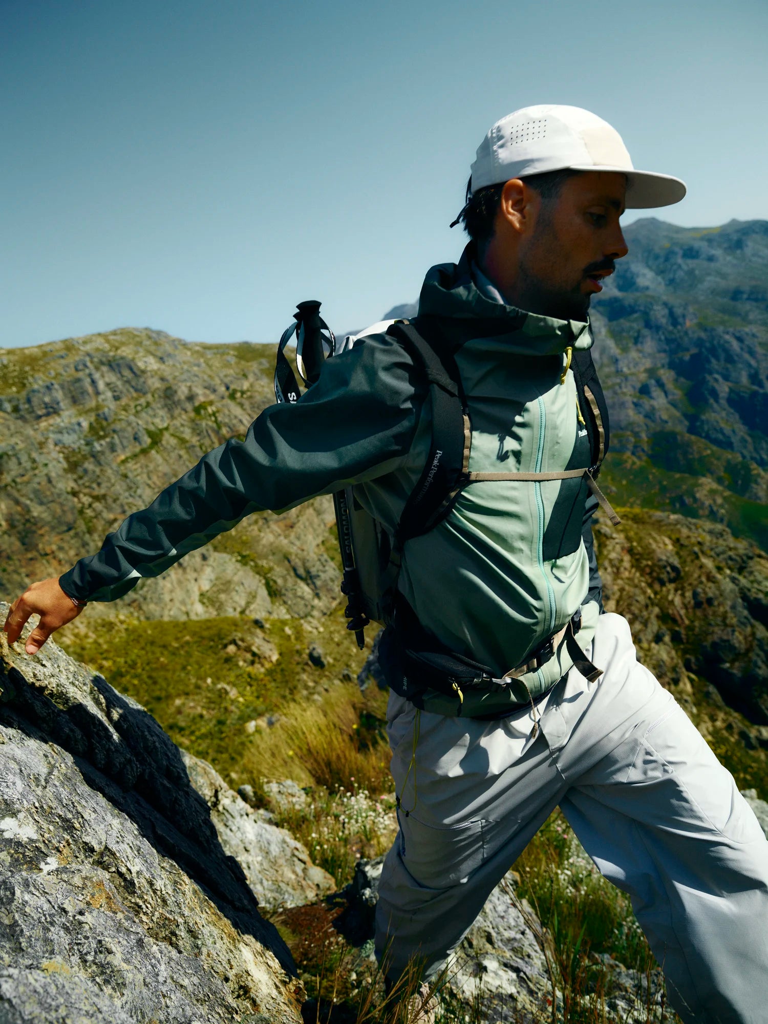 Man hiking on a mountain with a backpack